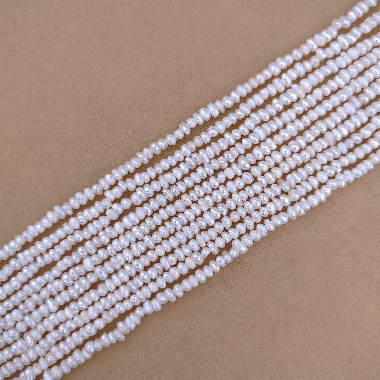 Web Based Natural Freshwater Pearl 3-4mm Flat Bead
