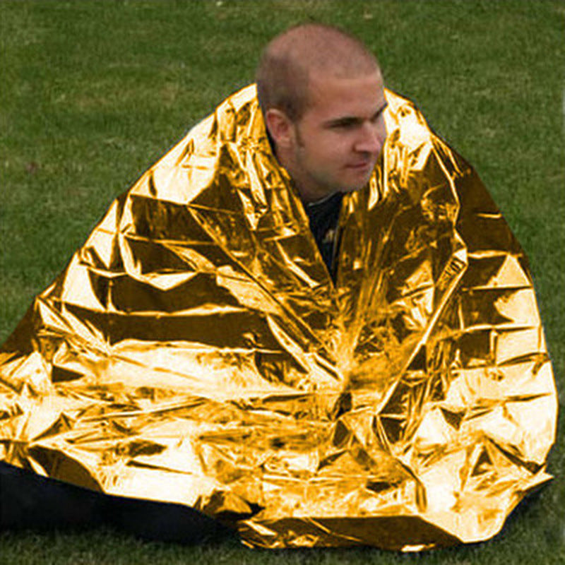 Web Based Human Body Hypothermia Lifesaving Emergency Blanket In Outdoor Field