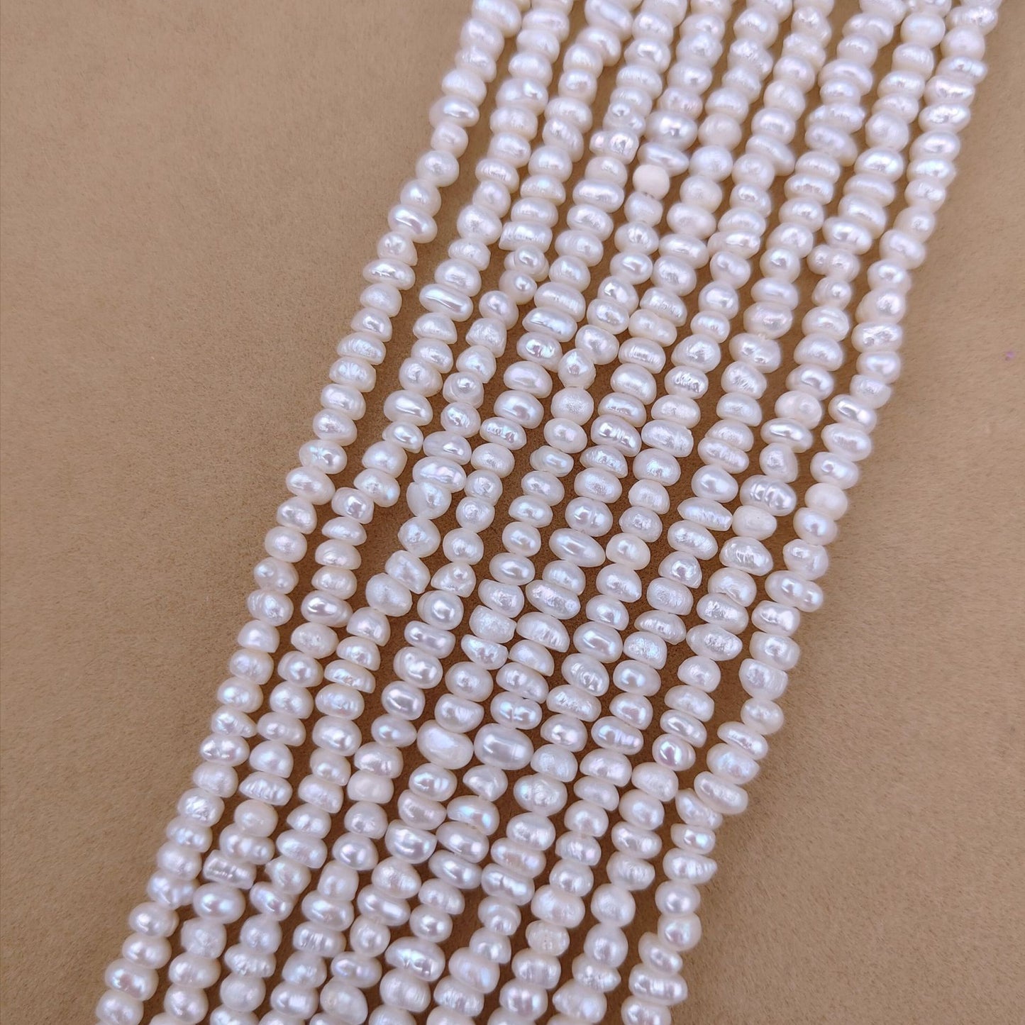 Web Based Natural Freshwater Pearl 3-4mm Flat Bead