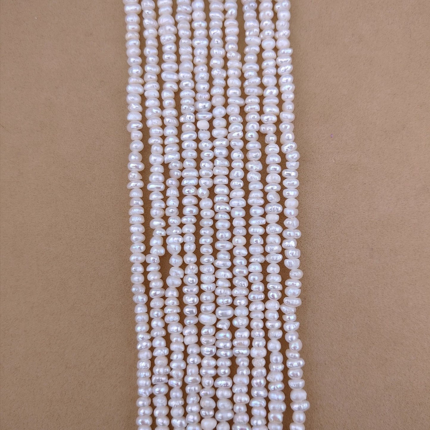 Web Based Natural Freshwater Pearl 3-4mm Flat Bead