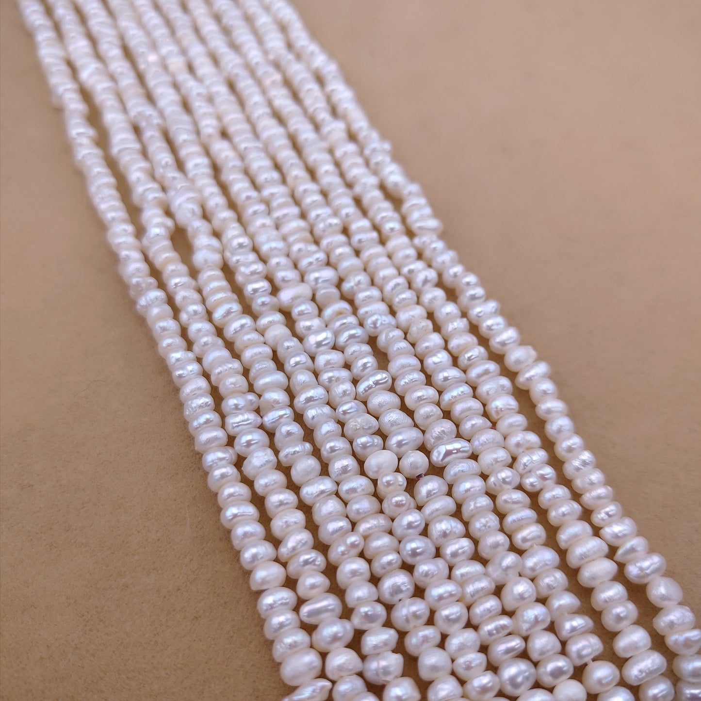 Web Based Natural Freshwater Pearl 3-4mm Flat Bead